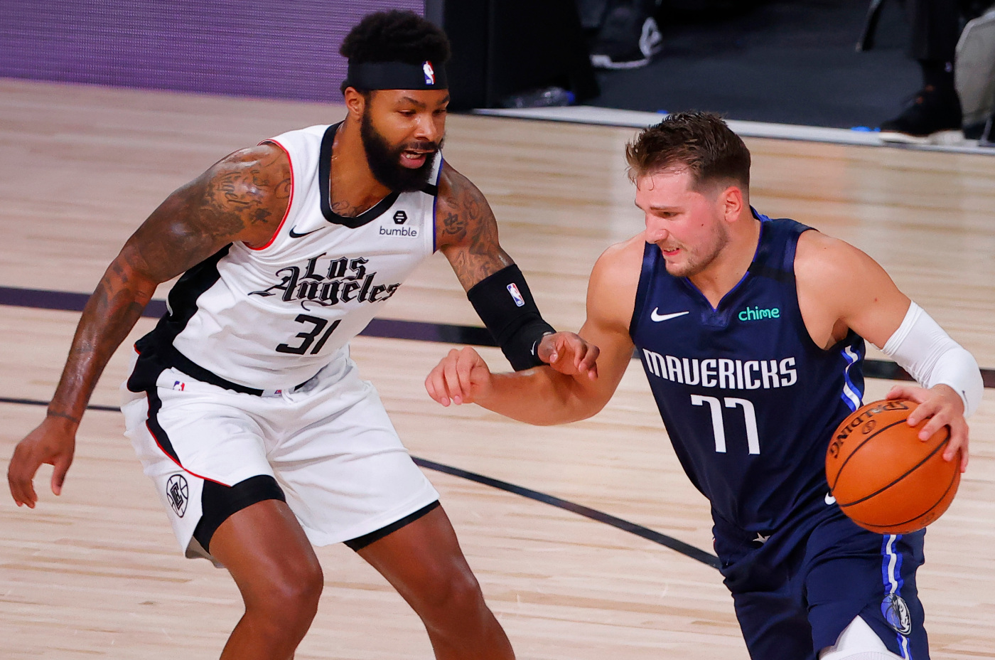 Clippers star Marcus Morris guarding Luka Doncic