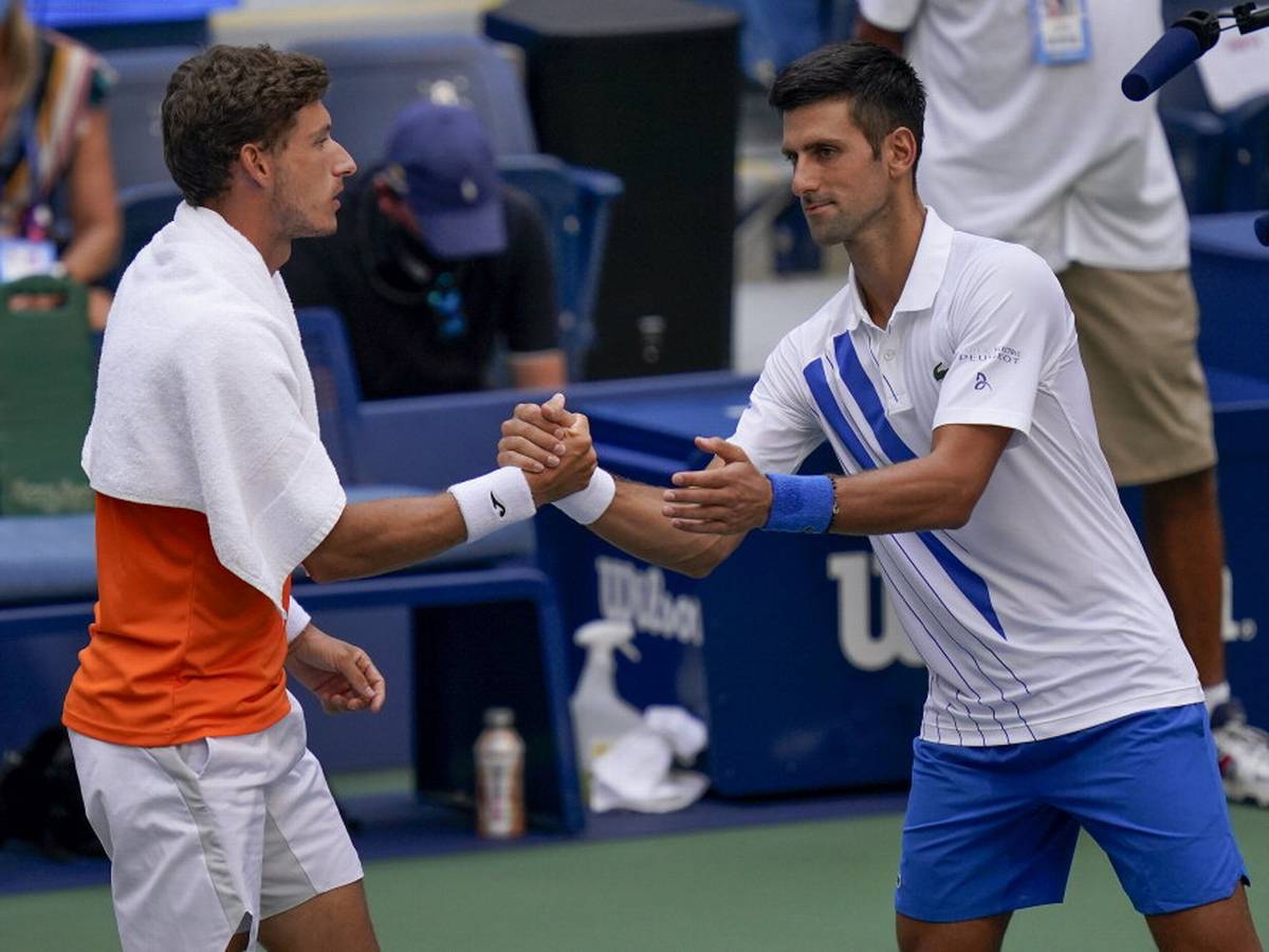 Novak Djokovic et Pablo Carreno Busta